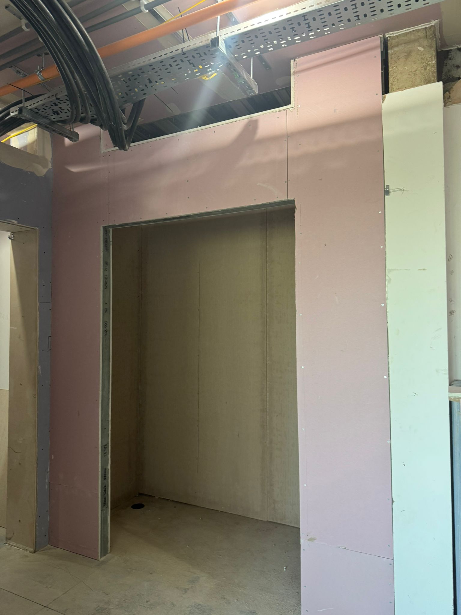 Completed MF ceiling system with services boxed in